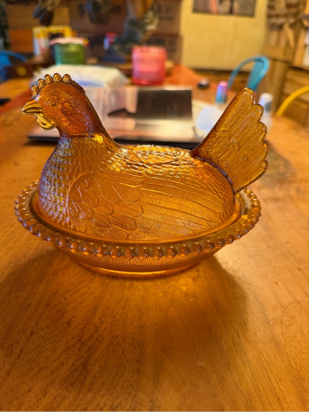 Vintage Indiana Amber Hen on stippled base means older, new has striated base,